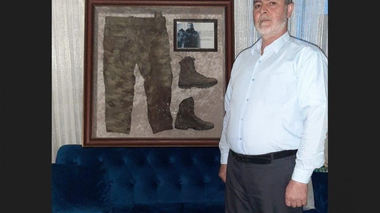 Şehit babasından seçmenlere çağrı! Oğlunun kıyafetini gösterip seslendi